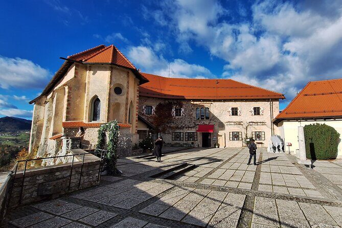 Best of Slovenia: Bled, Postojna, Ljubljana Day Tour from Zagreb - Bled Island: pletna boats, 99 steps, and a bell
